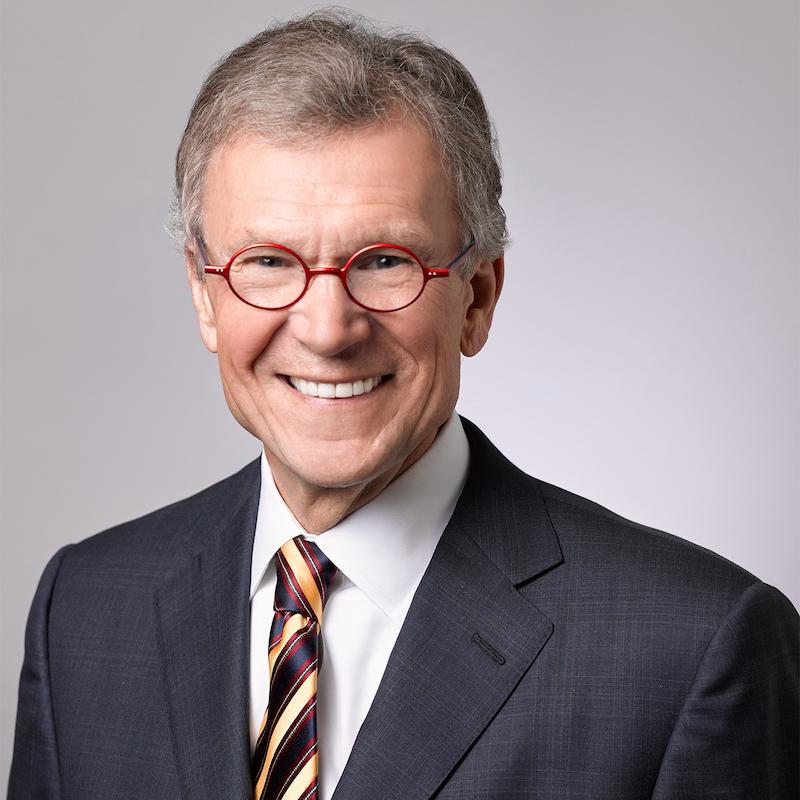 Senator Tom Daschle with red-framed glasses